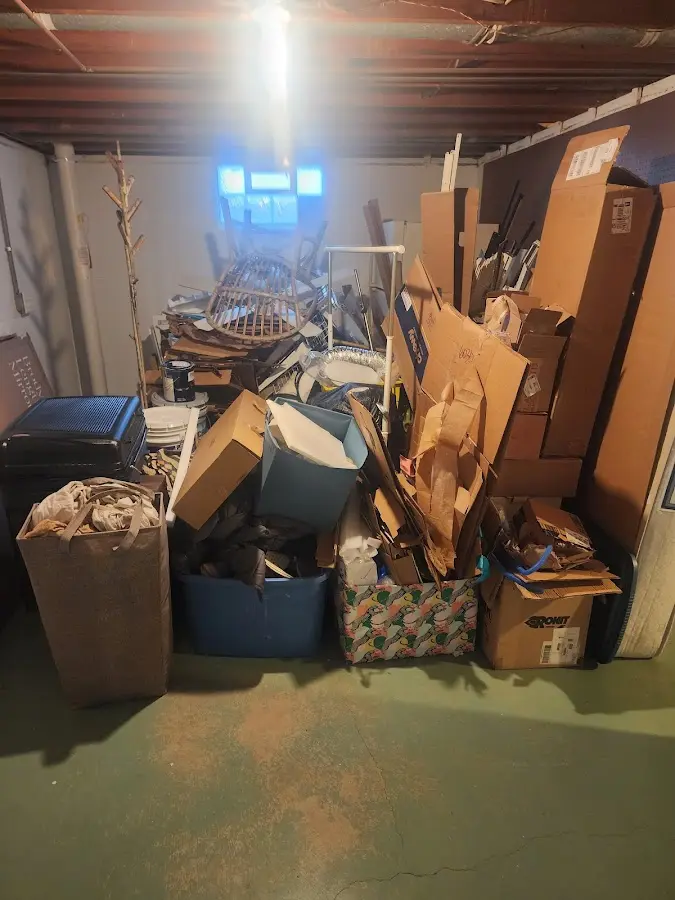 Roll-off dumpster container at job site for Construction Dumpster Rental in Bardstown